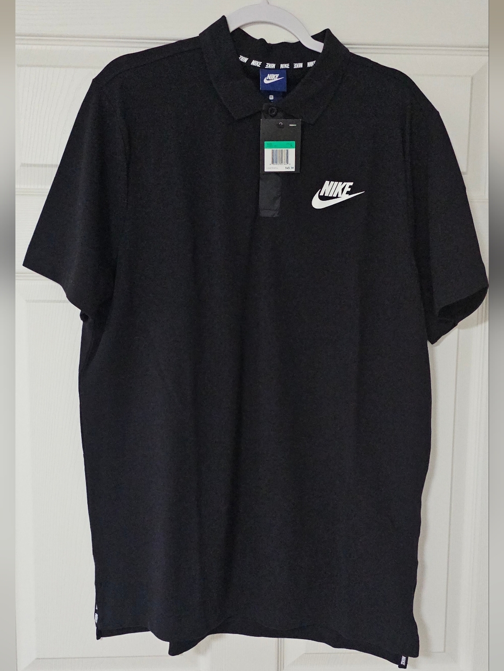 NWT Nike Black Polo Shirt with White Swoosh Logo
